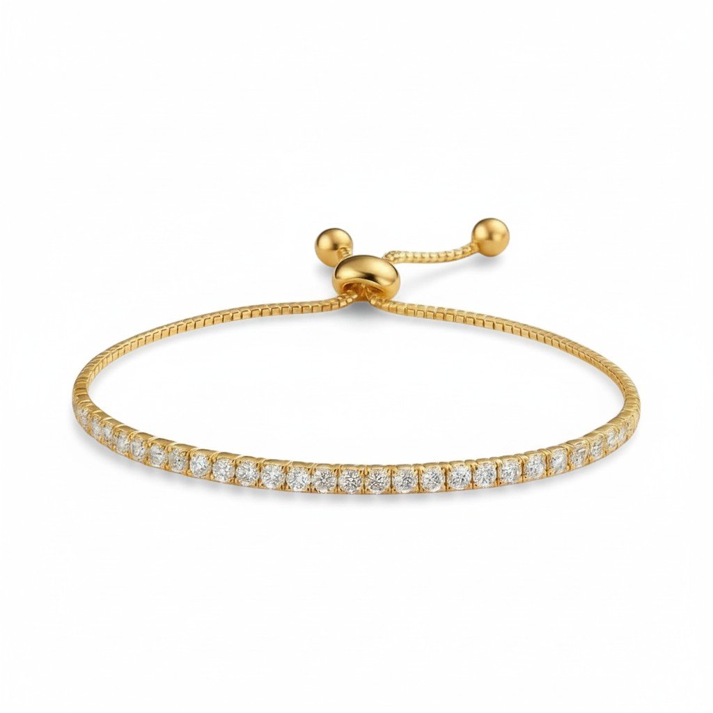 Gold bracelet with diamond accents on a white background